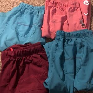 4 pairs of medium carhartt scrub pants